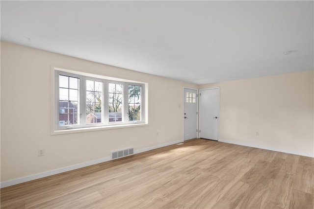 empty room featuring light wood-type flooring