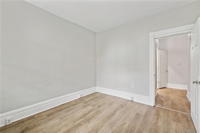 unfurnished room featuring light hardwood / wood-style floors