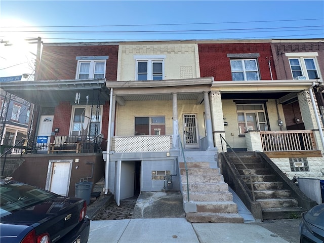 multi unit property featuring covered porch