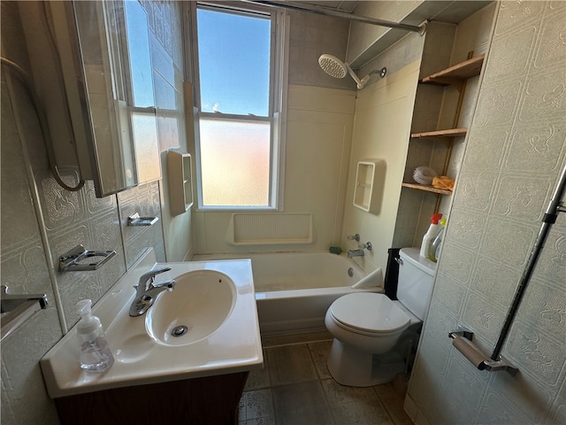 full bathroom featuring bathtub / shower combination, toilet, and vanity