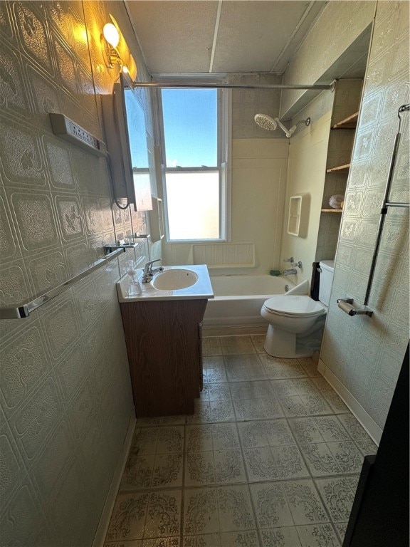 full bathroom featuring tile patterned flooring, vanity, shower / bath combination, and toilet