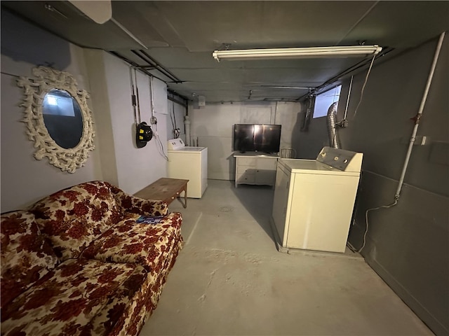 basement with washing machine and dryer