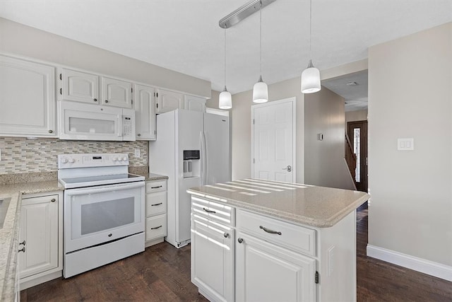 kitchen with white appliances, dark wood-type flooring, white cabinetry, and a kitchen island