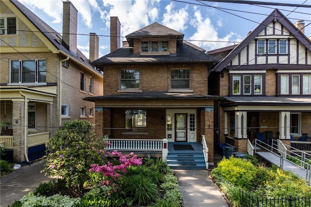 view of front of property featuring covered porch