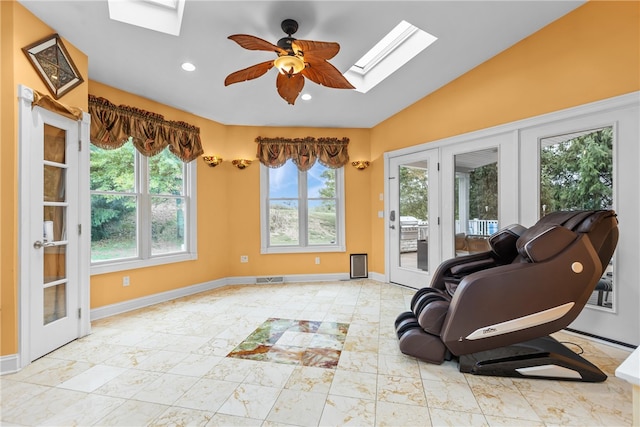 interior space featuring ceiling fan, lofted ceiling, and french doors