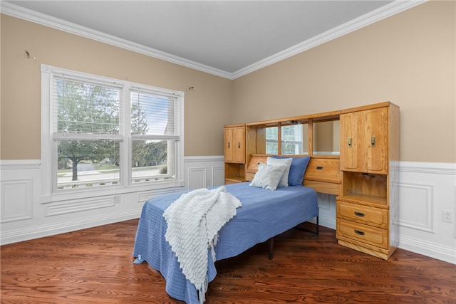 bedroom with dark hardwood / wood-style flooring and crown molding