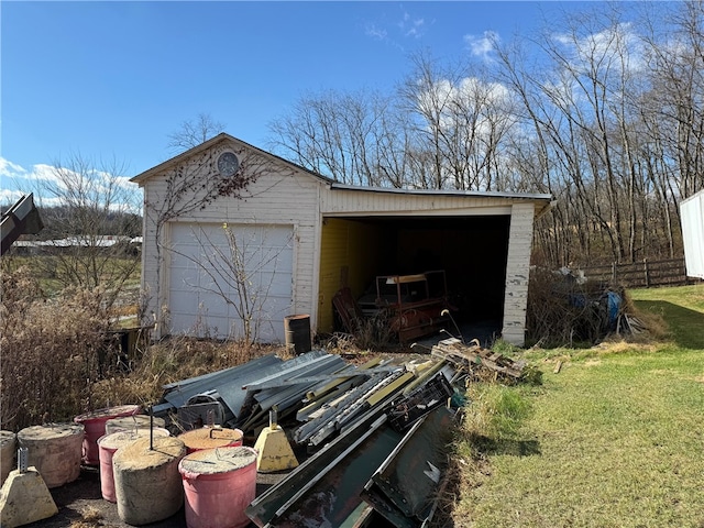 garage with a lawn