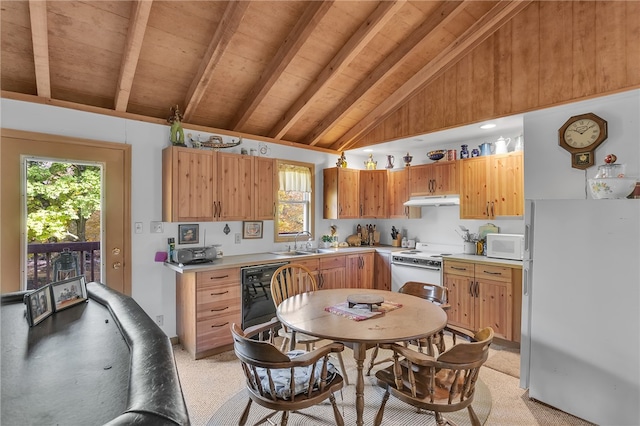 kitchen with beam ceiling, plenty of natural light, high vaulted ceiling, and white appliances