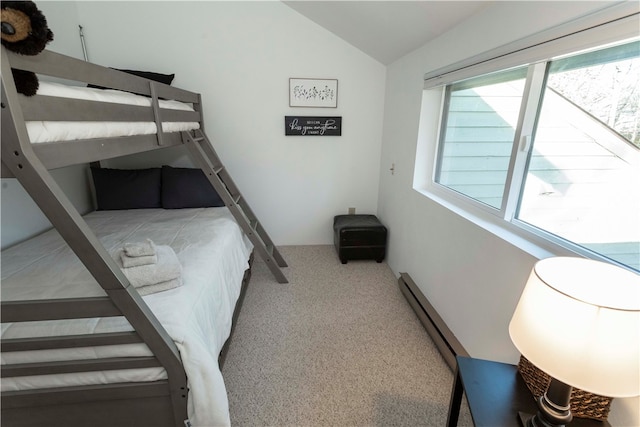 carpeted bedroom featuring vaulted ceiling