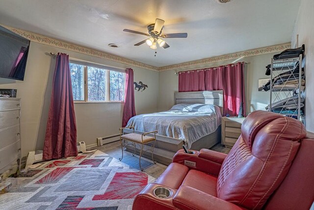 156 Sundust Rd, Nottingham, PA 15330 - bedroom featuring baseboard heating and a ceiling fan