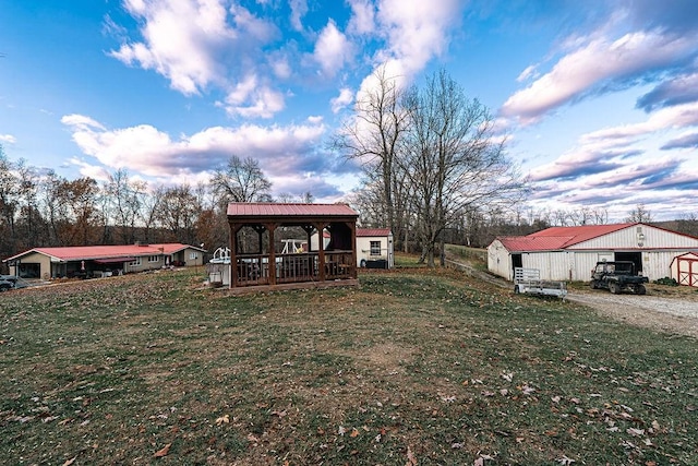 156 Sundust Rd, Nottingham, PA 15330 - view of grassy yard with a gazebo, an outbuilding, and gravel driveway