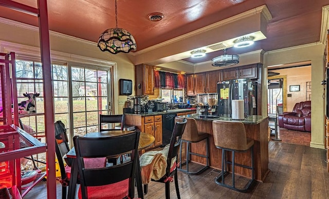 156 Sundust Rd, Nottingham, PA 15330 - kitchen with freestanding refrigerator, dishwasher, dark countertops, dark wood finished floors, and ornamental molding