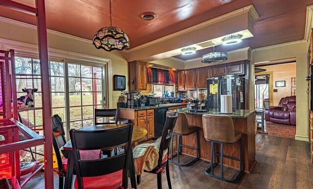 156 Sundust Rd, Nottingham, PA 15330 - kitchen with freestanding refrigerator, dishwasher, dark countertops, dark wood finished floors, and ornamental molding