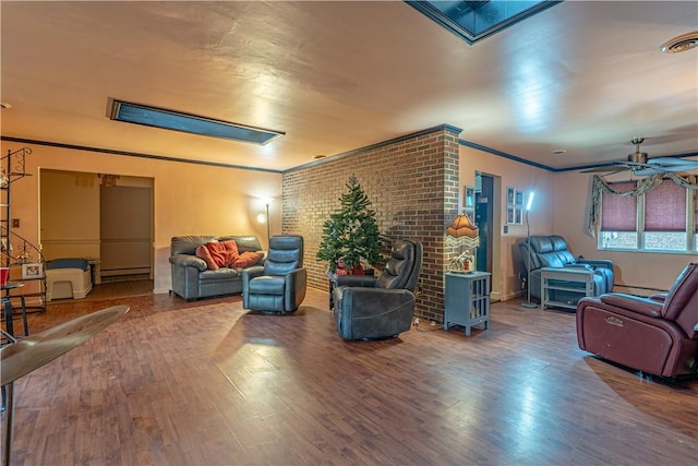 156 Sundust Rd, Nottingham, PA 15330 - living area with a baseboard radiator, wood finished floors, ceiling fan, and crown molding
