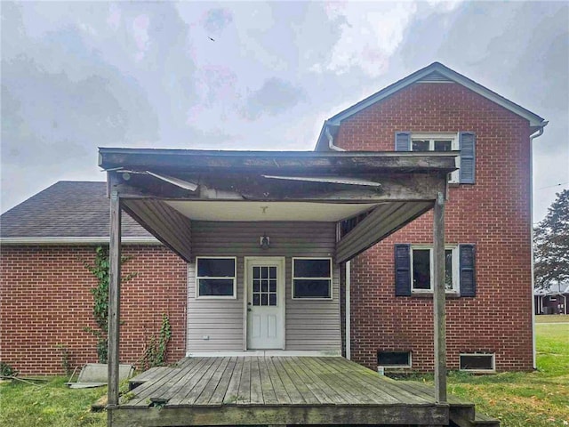 rear view of house with a deck