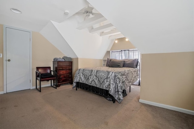 bedroom featuring vaulted ceiling with beams, ceiling fan, and carpet