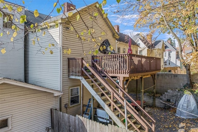 rear view of property with a deck