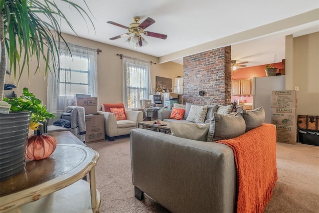 living room featuring ceiling fan and light carpet