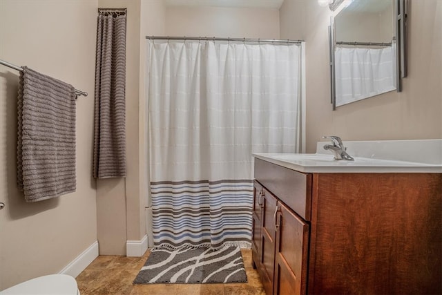 bathroom with vanity and tile patterned floors