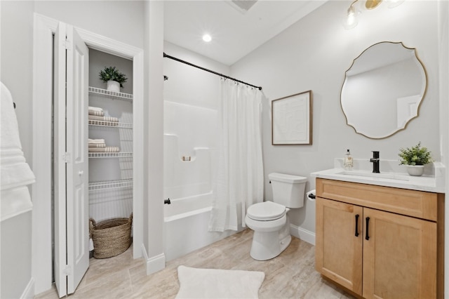 full bathroom featuring vanity, shower / bathtub combination with curtain, and toilet