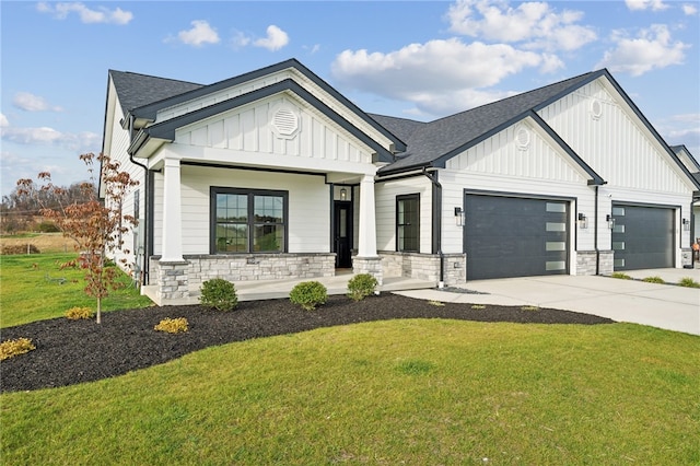 modern farmhouse with a garage and a front lawn