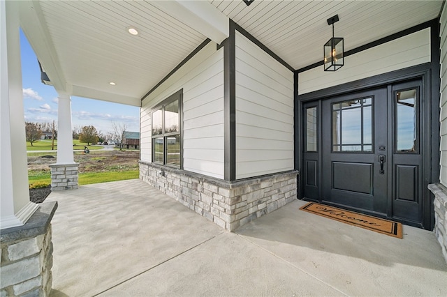 entrance to property with a porch