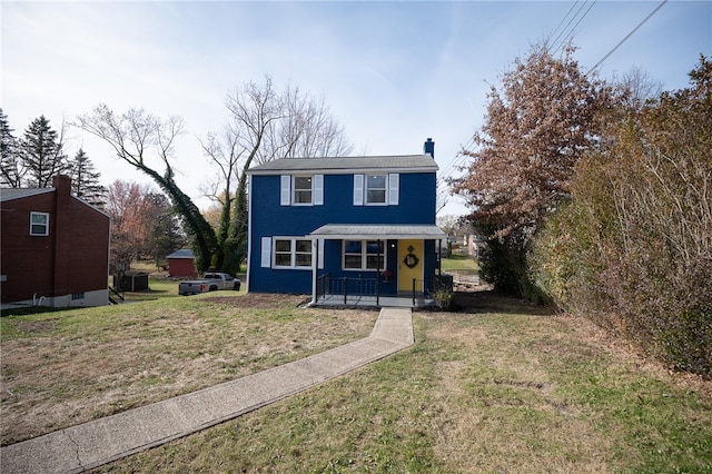 view of front of home featuring covered porch and a front yard