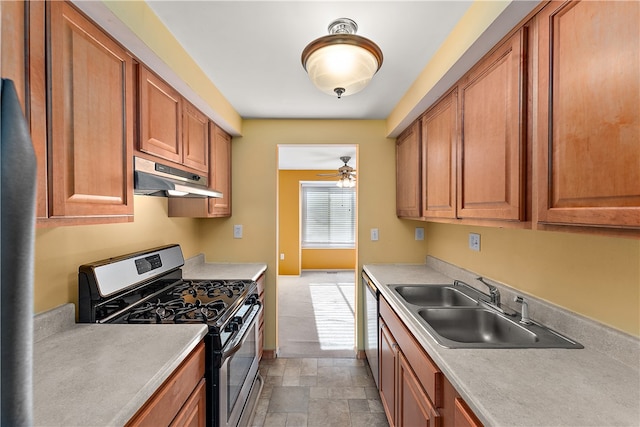 kitchen with ceiling fan, sink, and stainless steel appliances