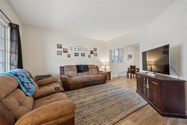 living room with light hardwood / wood-style floors