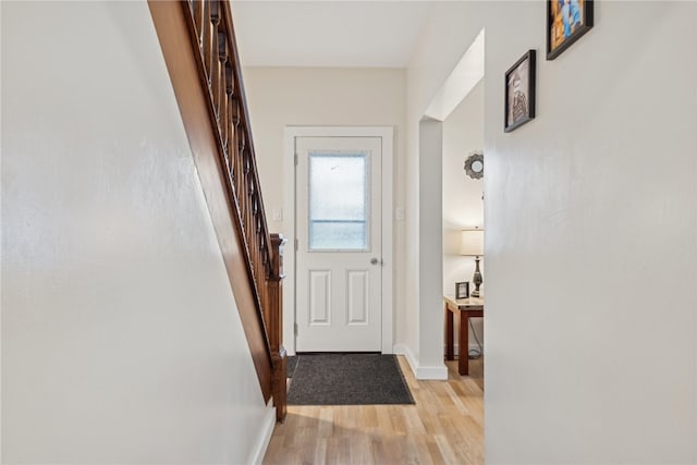 entryway with light hardwood / wood-style flooring