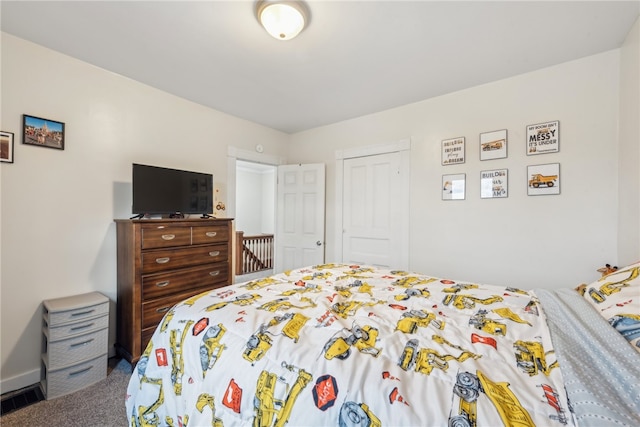 bedroom featuring carpet floors and a closet