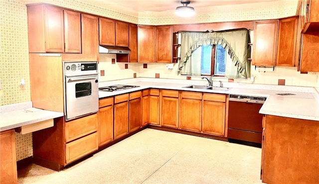 kitchen featuring white appliances and sink