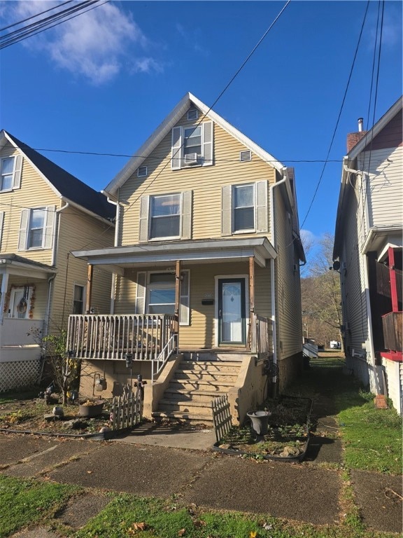 view of front property featuring a porch