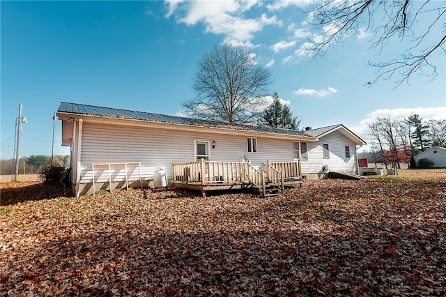 rear view of house with a deck