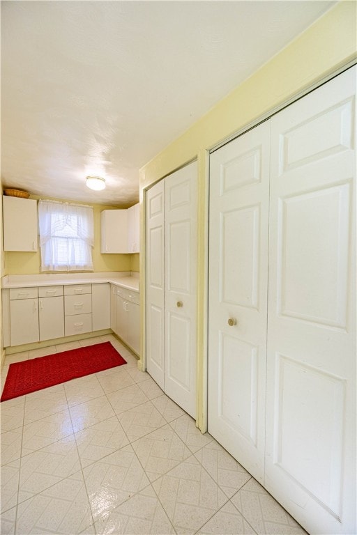 kitchen with light tile patterned floors