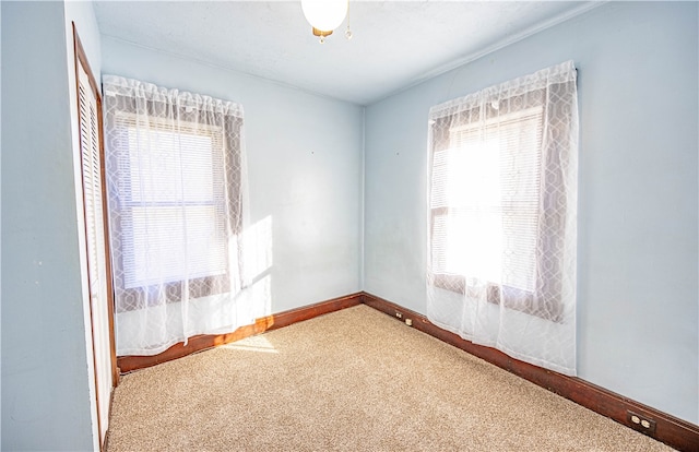 view of carpeted spare room