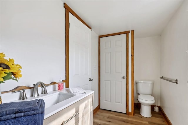 175 Long Woods Rd, Waynsbrg/Frankln Twp, PA 15370 - bathroom with toilet, wood finished floors, vanity, and baseboards