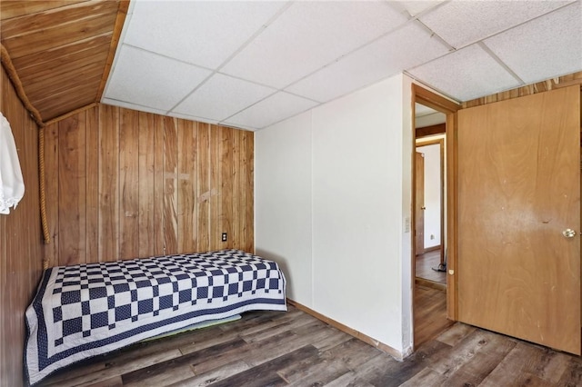 175 Long Woods Rd, Waynsbrg/Frankln Twp, PA 15370 - bedroom with a drop ceiling, wood walls, and wood finished floors