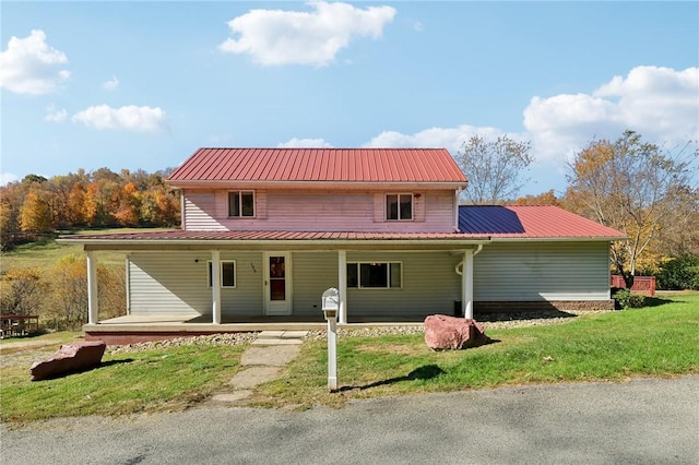 175 Long Woods Rd, Waynsbrg/Frankln Twp, PA 15370 - view of front of home with metal roof, a porch, and a front lawn