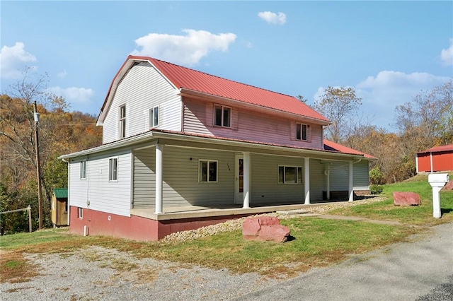 175 Long Woods Rd, Waynsbrg/Frankln Twp, PA 15370 - view of front of home with covered porch, metal roof, and a front lawn