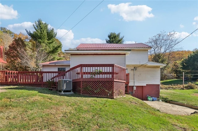 175 Long Woods Rd, Waynsbrg/Frankln Twp, PA 15370 - rear view of property with a deck, a yard, cooling unit, and metal roof