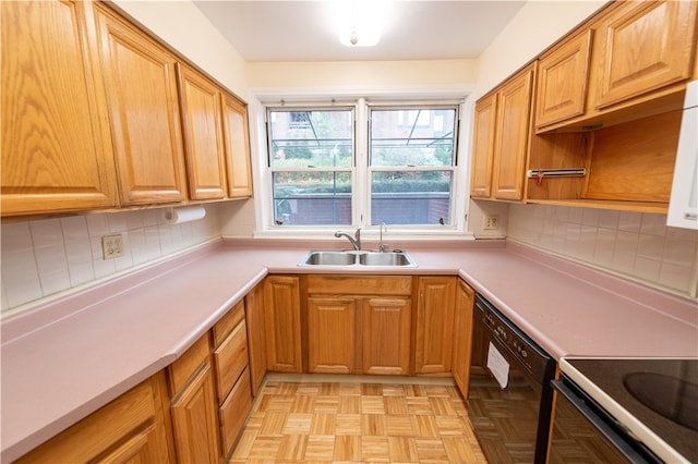 kitchen with decorative backsplash, black dishwasher, sink, and light parquet flooring