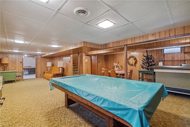 playroom with carpet, a drop ceiling, wood walls, and billiards