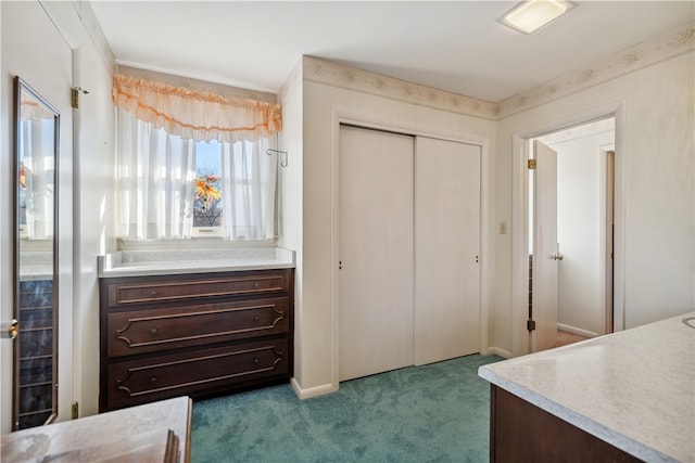 carpeted bedroom with a closet