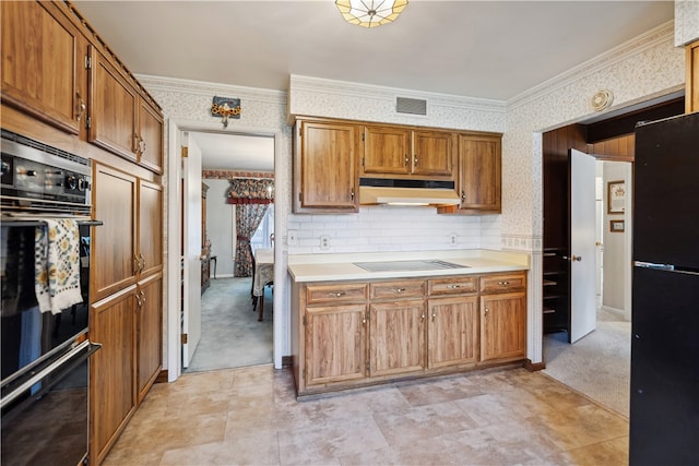 kitchen with light carpet, tasteful backsplash, ornamental molding, and black appliances