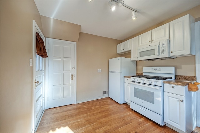 kitchen with light hardwood / wood-style flooring, white cabinets, white appliances, and rail lighting