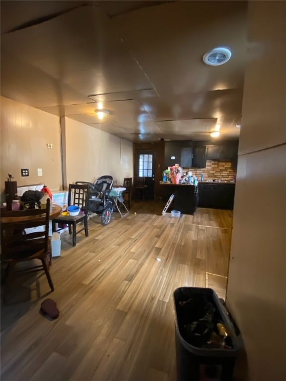 basement with wood-type flooring