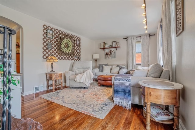 living room with dark wood-type flooring