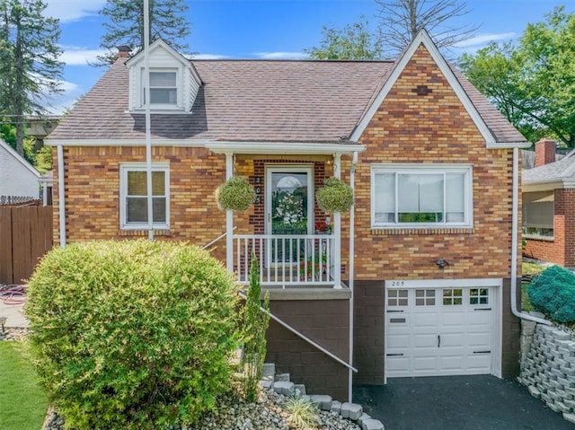 view of front of property with a garage