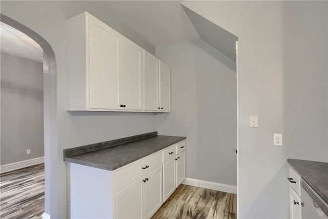 interior space featuring white cabinets and light hardwood / wood-style floors